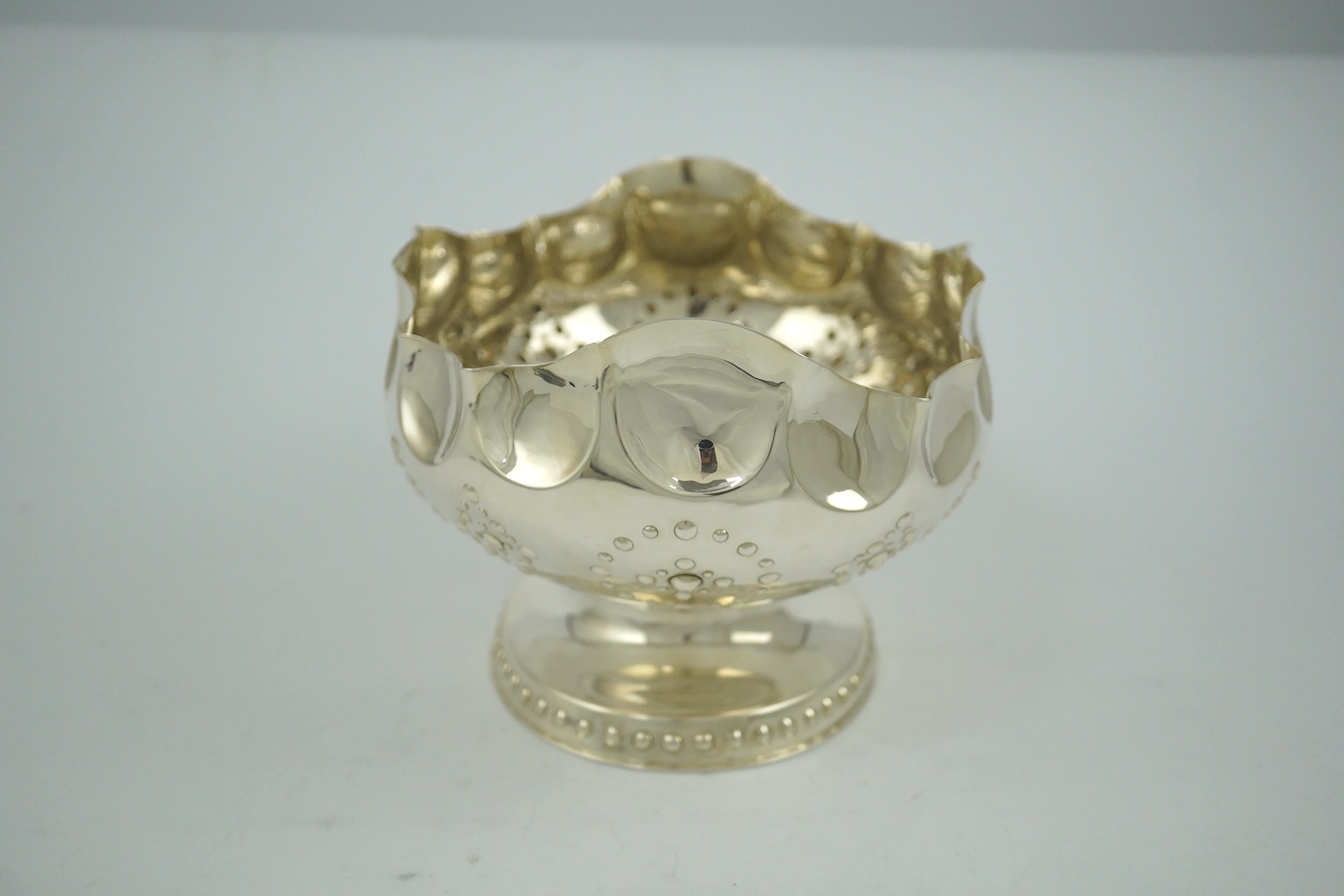 A late Victorian silver oval pedestal fruit bowl by Elkington & Co